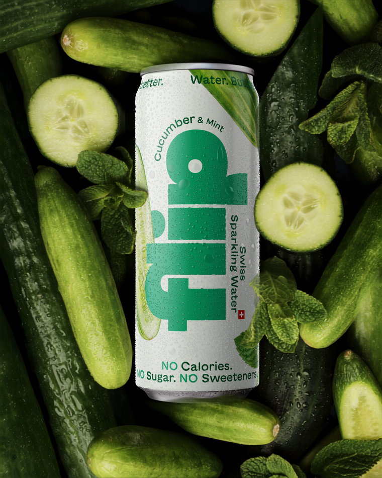 Can of flip sparkling water surrounded by cucumbers and mint leaves